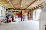 Discover the endless possibilities of this spacious storage area.