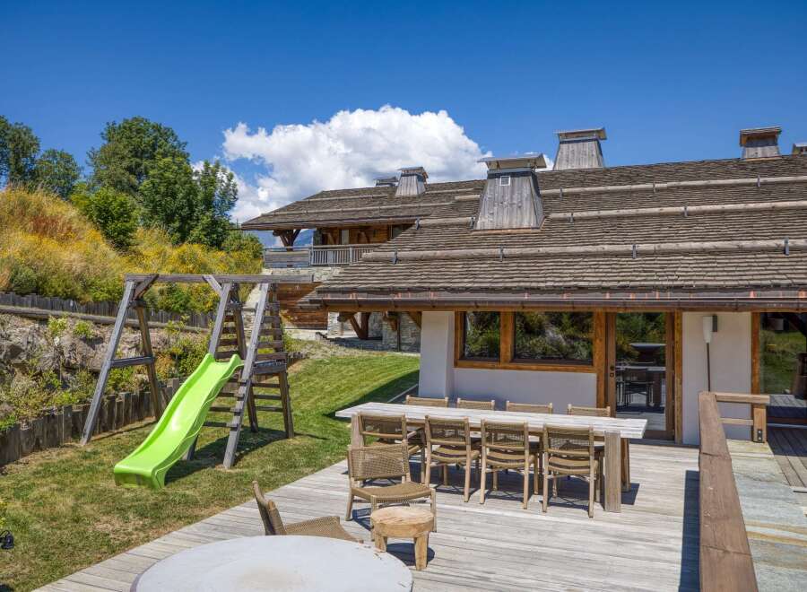 Experience luxury living in this stunning property featuring a spacious outdoor deck perfect for entertaining.