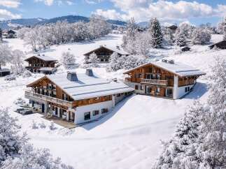 Experience the epitome of luxury living in this stunning chalet nestled in a winter wonderland.