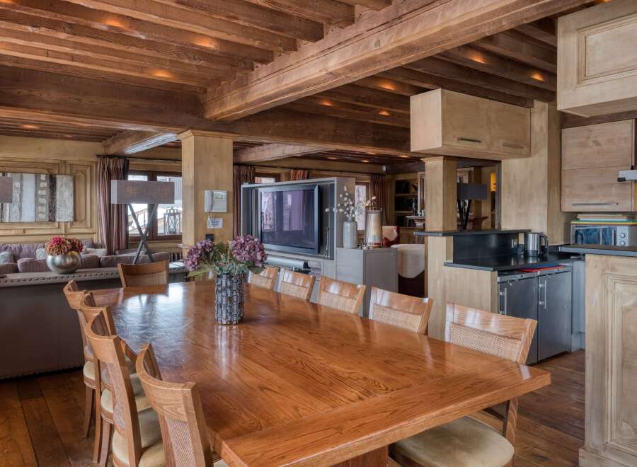 Experience the allure of this open-concept living space, seamlessly blending dining and lounging areas.