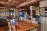 Experience the allure of this open-concept living space, seamlessly blending dining and lounging areas.