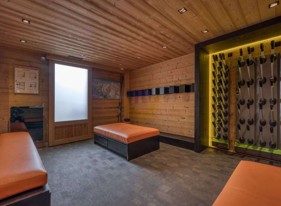 Step into this meticulously designed ski room, a true asset for any ski property.