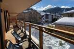 Enjoy breathtaking mountain views from this stunning balcony.