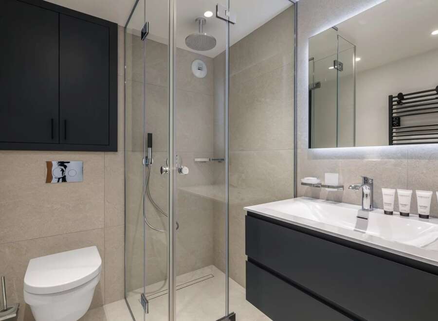 Step into modern luxury with this stunning bathroom.