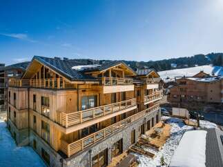 Discover the epitome of alpine luxury in this stunning wooden chalet.