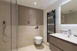Step into modern luxury with this stunning bathroom.