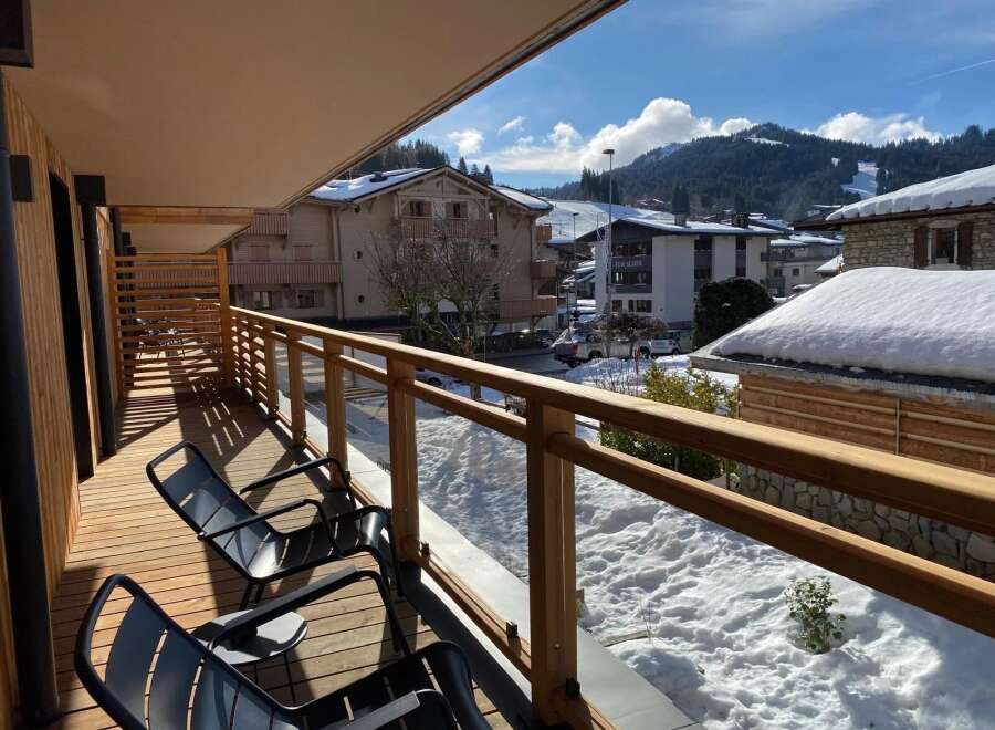 Enjoy breathtaking mountain views from this stunning balcony.
