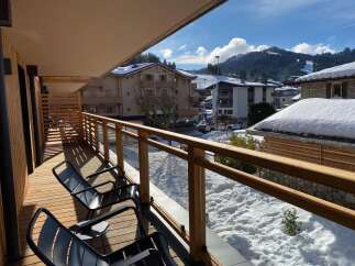 Enjoy breathtaking mountain views from this stunning balcony.