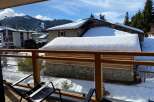 Enjoy breathtaking mountain views from this charming chalet.