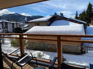 Enjoy breathtaking mountain views from this charming chalet.