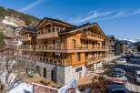 Discover the charm of this stunning wooden chalet, perfectly nestled in a picturesque mountain setting.