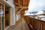Experience the charm of this stunning property featuring a spacious balcony with breathtaking mountain views.