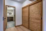 Step into luxury with this stunning property featuring exquisite wooden sliding doors and a beautifully designed bathroom.
