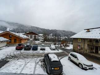Nestled in a picturesque winter wonderland, this property offers stunning views of snow-covered mountains and charming chalets.