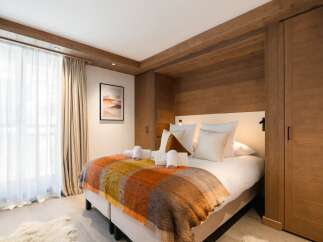 Experience the epitome of comfort in this stunning bedroom.