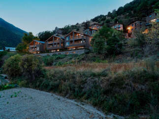 Nestled in the mountains, these stone-clad properties offer a serene escape with stunning natural surroundings.