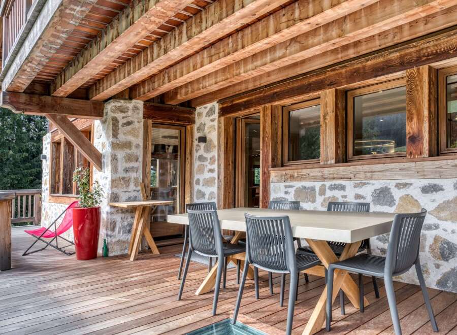 This property boasts a charming outdoor dining area, perfect for enjoying meals amidst nature.