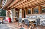 This property boasts a charming outdoor dining area, perfect for enjoying meals amidst nature.