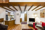 Step into this charming property featuring exposed wooden beams that add rustic elegance.