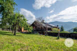 Nestled in a serene landscape, this charming chalet offers a tranquil retreat with stunning mountain views.