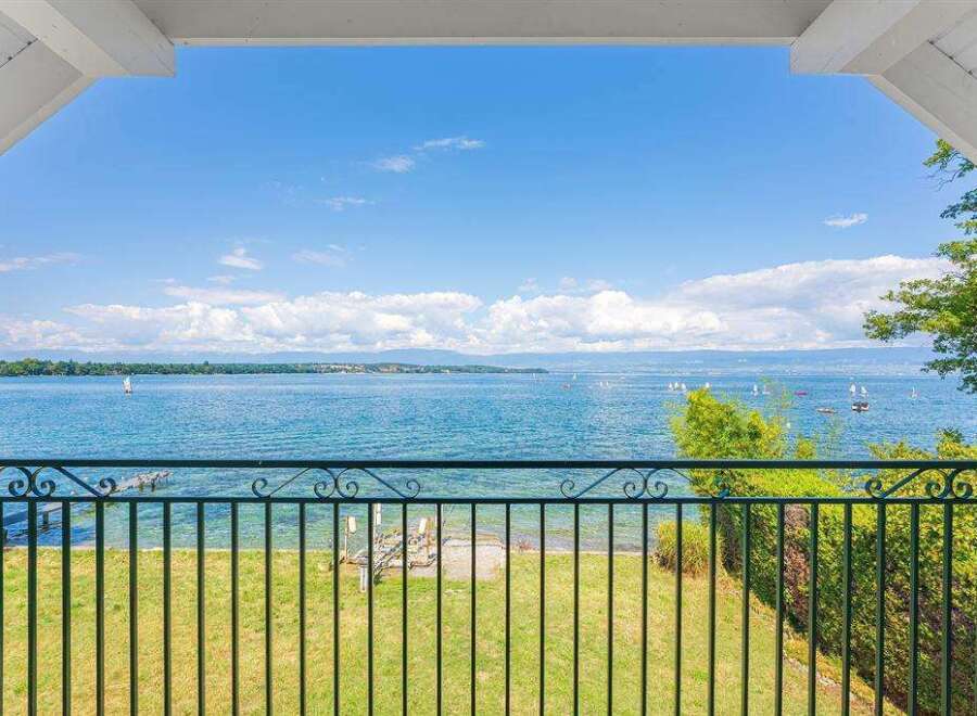 Enjoy breathtaking lake views from this stunning property's balcony.