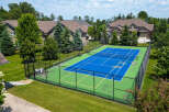 Discover a property with fantastic recreational amenities, including a well-maintained tennis court perfect for sports enthusiasts.
