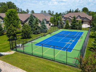 Discover a property with fantastic recreational amenities, including a well-maintained tennis court perfect for sports enthusiasts.
