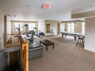 This spacious recreational room is the perfect addition to any luxury home.
