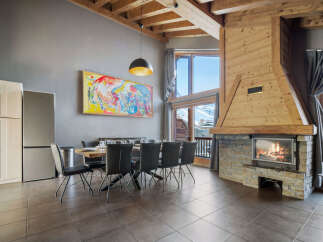This stunning property boasts a cozy fireplace, perfect for chilly evenings.