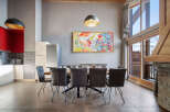 This stunning property boasts a modern dining area, perfect for entertaining guests.