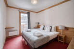 Experience the ultimate comfort in this cozy bedroom, perfect for a relaxing getaway.
