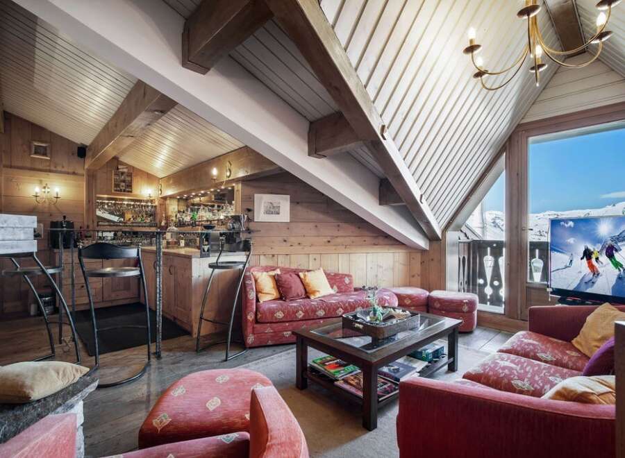 Experience luxury living in this stunning chalet, perfect for a mountain getaway.