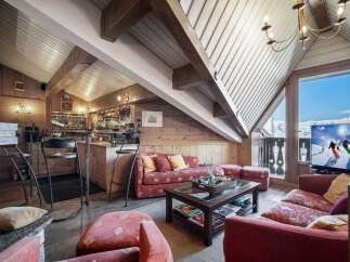 Experience luxury living in this stunning chalet, perfect for a mountain getaway.