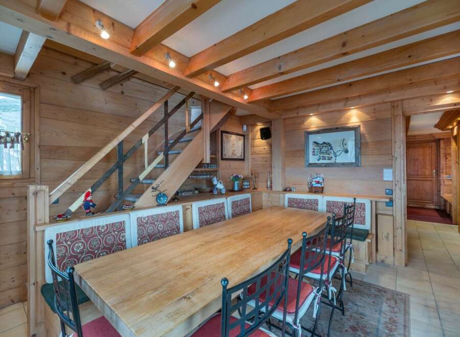Step into rustic elegance with this charming dining area.