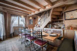 Step into this charming dining area, featuring a rustic wooden design that exudes warmth and character.