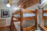 This charming property features a cozy bunk bed, perfect for accommodating guests or family members.