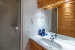 This charming bathroom features a bright and airy design, perfect for starting your day.