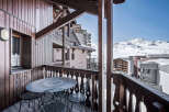 Enjoy breathtaking mountain views from this charming balcony.