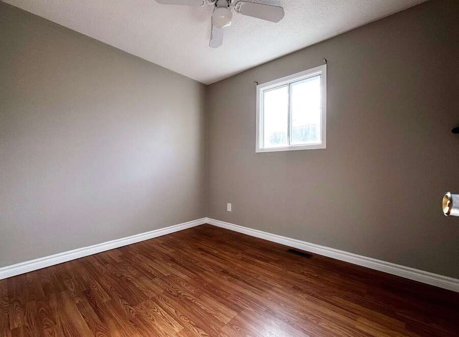 This inviting room features a neutral color palette, perfect for any decor style.