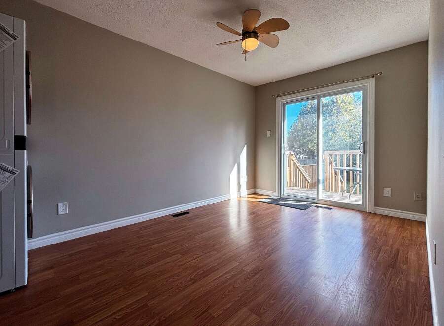 This inviting living space features beautiful hardwood floors and ample natural light.