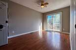 This inviting living space features beautiful hardwood floors and ample natural light.