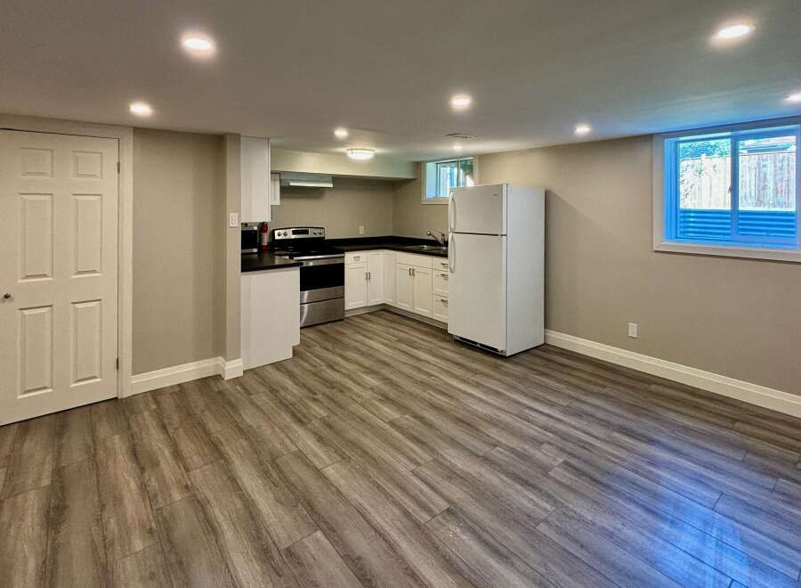 This inviting kitchen boasts modern appliances and ample counter space, perfect for culinary enthusiasts.