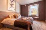 Experience tranquility in this beautifully designed bedroom.
