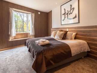 Experience tranquility in this beautifully designed bedroom.