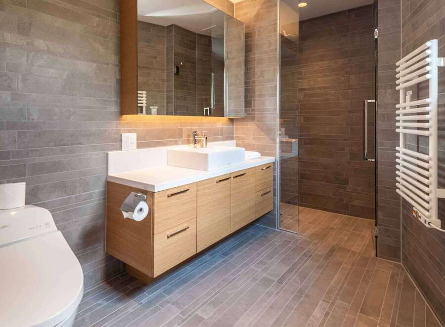 Step into a modern bathroom oasis, featuring sleek design and luxurious finishes.