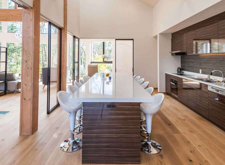 Experience luxury living in this stunning modern home! Featuring a spacious open-concept kitchen with a large island, perfect for entertaining.
