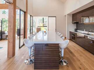 Experience luxury living in this stunning modern home! Featuring a spacious open-concept kitchen with a large island, perfect for entertaining.