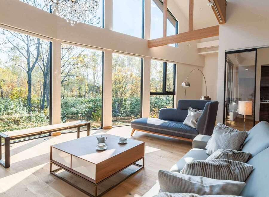 Experience the epitome of luxury living in this stunning property, boasting expansive windows that frame breathtaking views of the surrounding natural landscape.