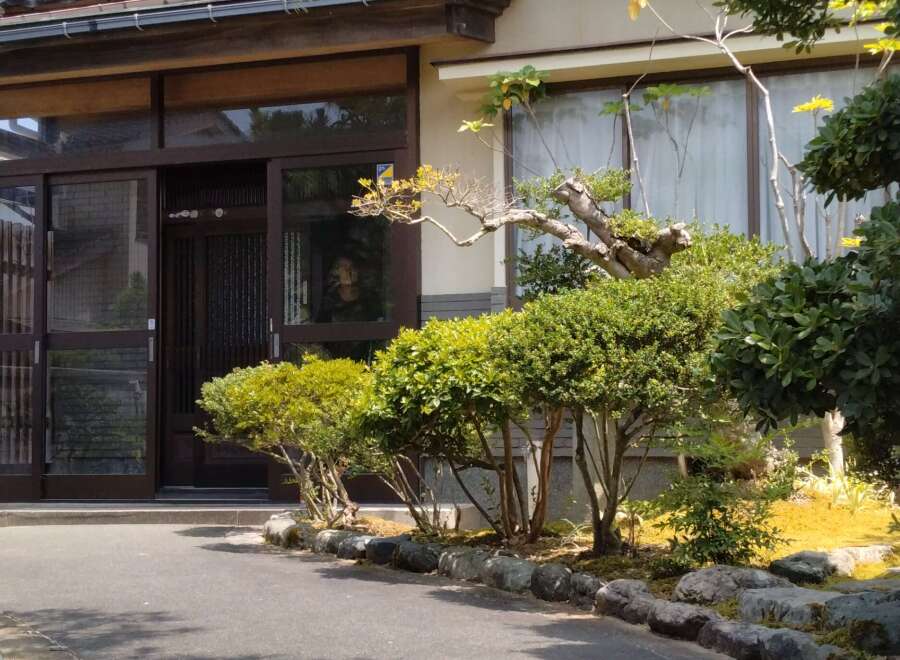 This stunning Japanese-style home boasts a serene and inviting atmosphere.