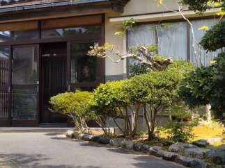 This stunning Japanese-style home boasts a serene and inviting atmosphere.